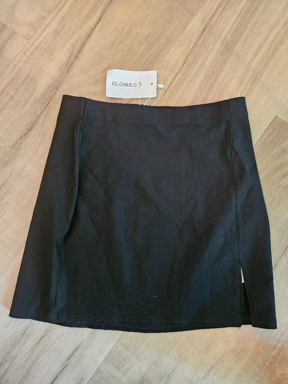 EG. CHRIS.G Black mini skirt size small. New with tags.